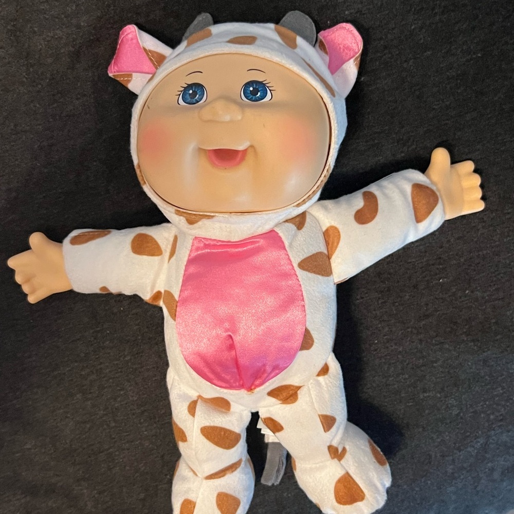 Cute Cow Print Doll with Pink Details